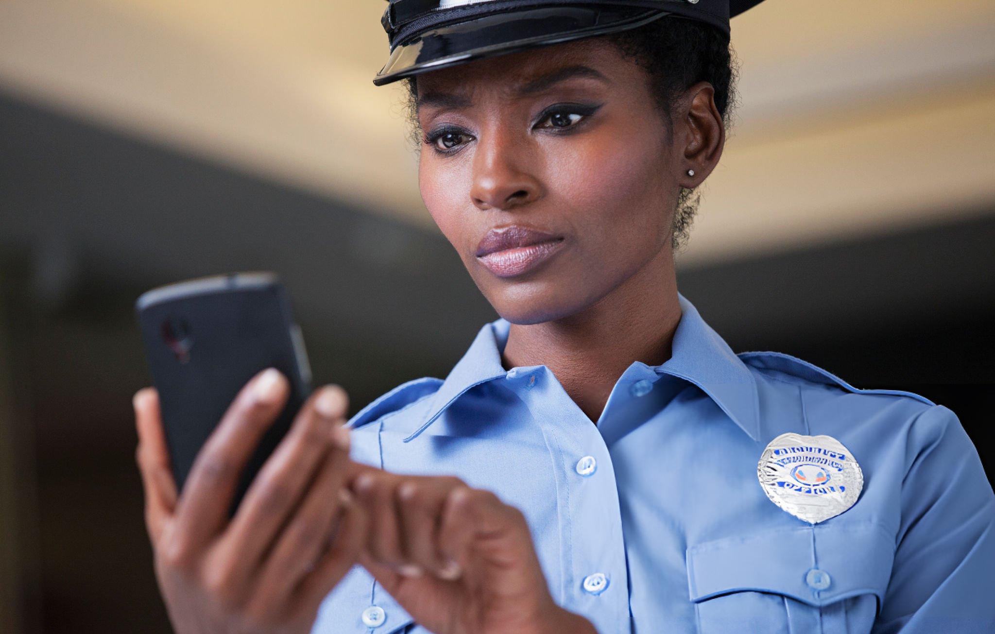 policewoman checking a phone